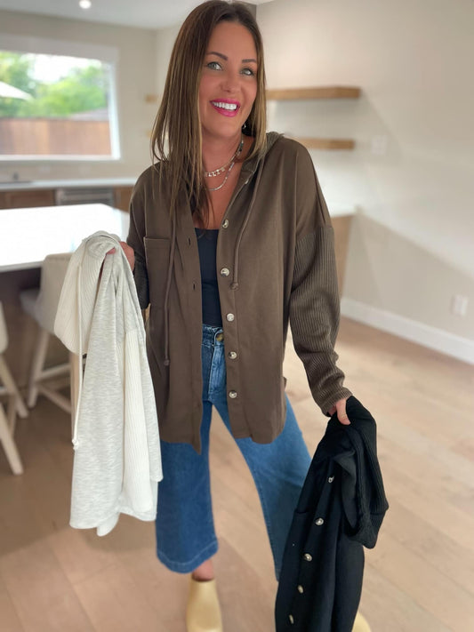 Sweater knit hood and sleeve details add style to this button-up jacket made with medium-weight sweatshirt fabric and a drawstring hood.