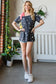 Star Print Asymmetrical Neck Short Sleeve Top